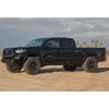 0-2.75 inch Lift Kit by ICON on a black 2016 Toyota Tacoma